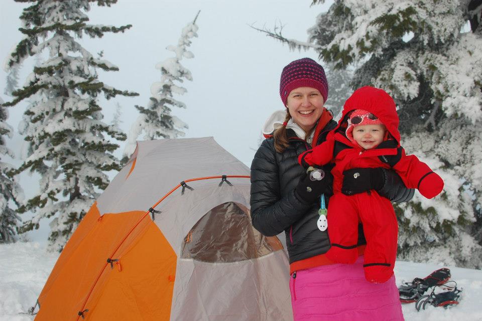 Katy Stuart snow camping in a bright pink down skirt. Photo by Ben Stuart.