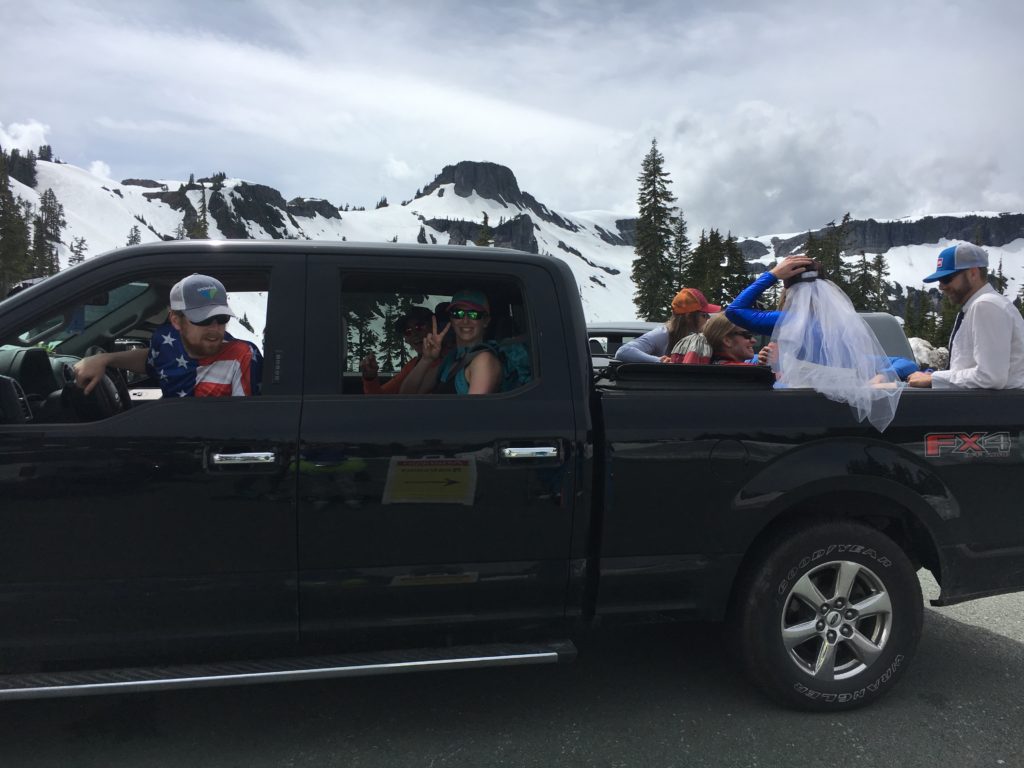 Skiers load in the back of a truck to ski at Artist Point, Mount Baker.
