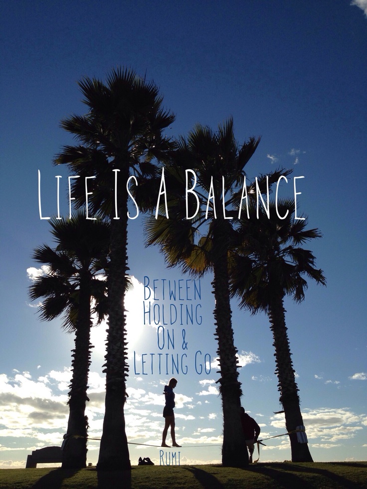 A quote is overlayed on a picture of palm trees in silhouette. It says "Live is a balance between holding on & letting go." - Rumi